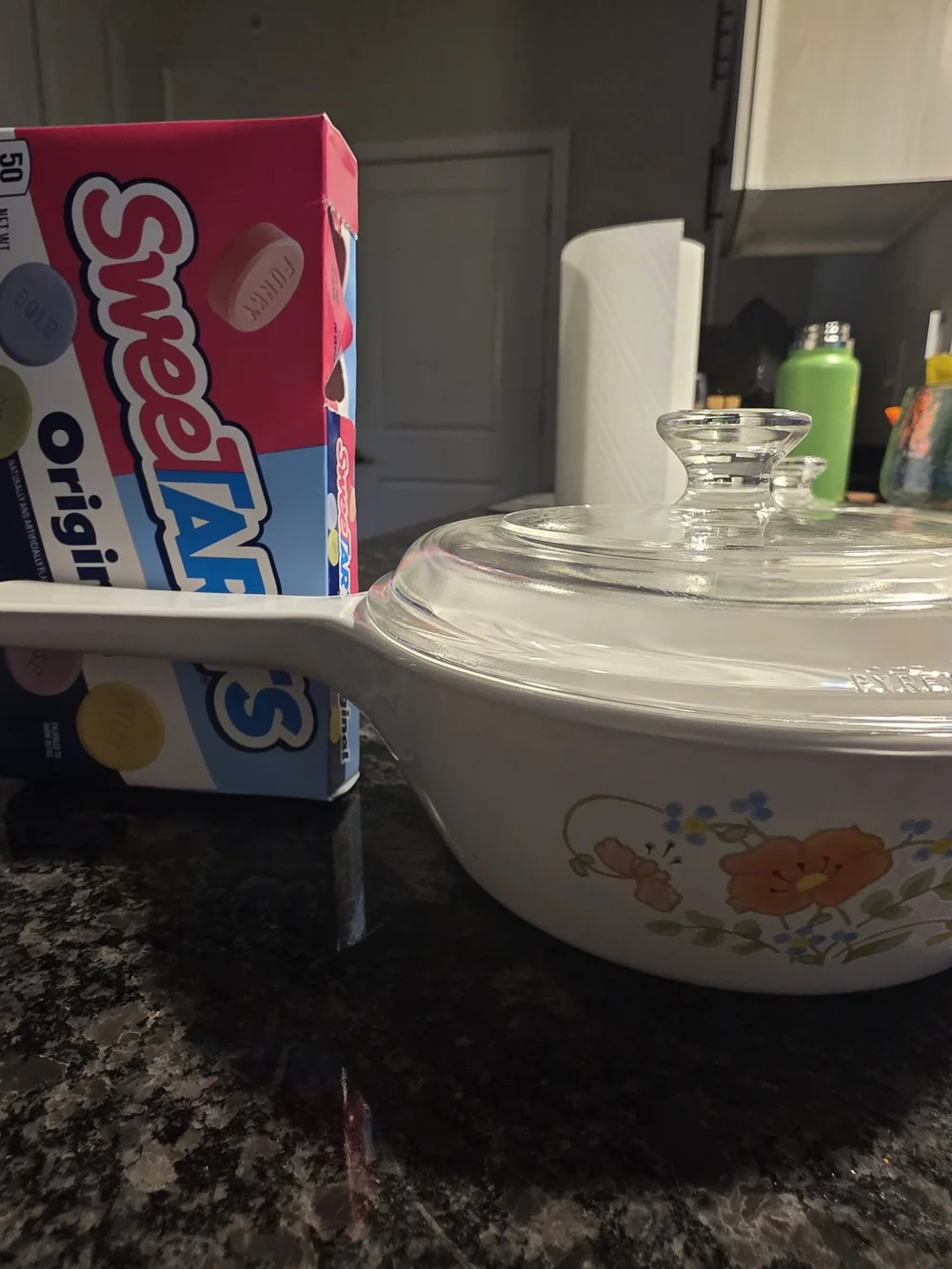 The Corning Ware Wildflower Saucepan/Skillet with Pyrex Lids.